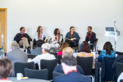 Five panel speakers on stage
